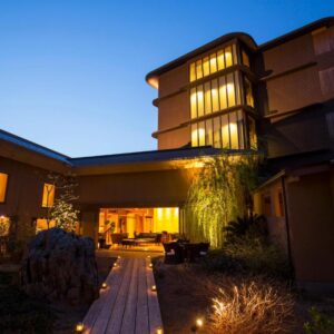 Night exterior with lit walkway leading to Amahara entrance in Hyōgo, Kansai, Japan