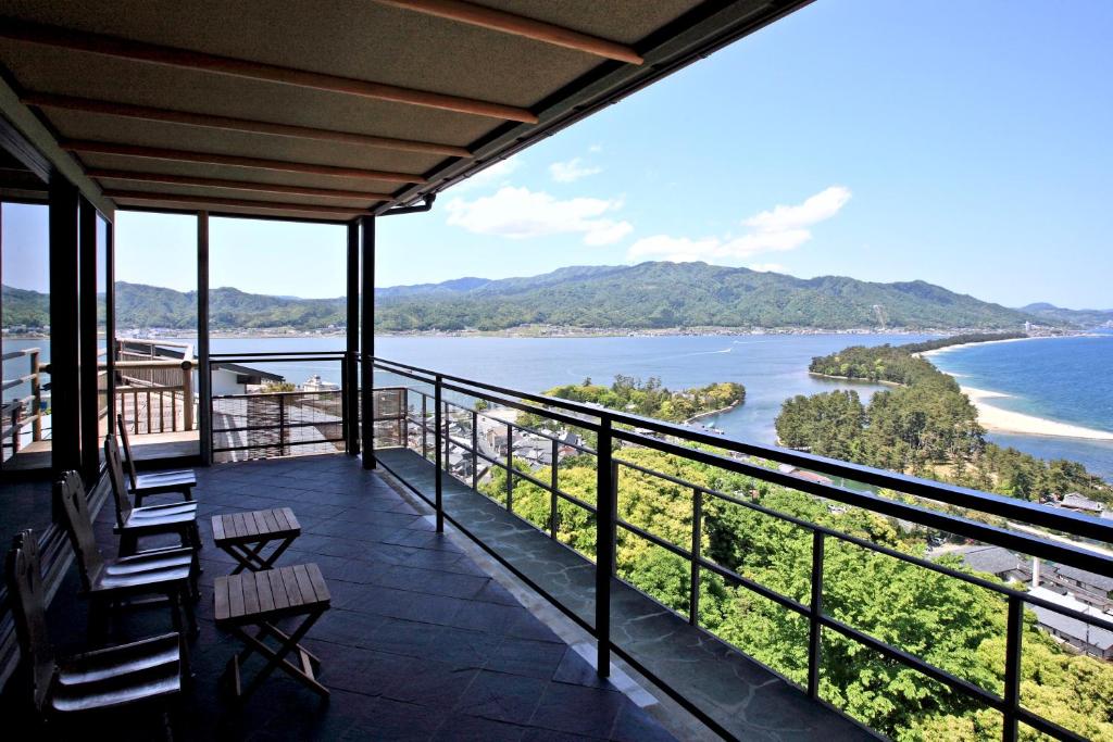 Terrace overlooking sandbar Genmyoan Kyoto Balcony chairs overlooking sandbar and bay at Genmyoan, Kyoto