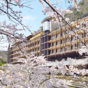 Exterior with cherry blossoms and balconies at Tenseien, Kanagawa, Kantō, Japan