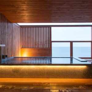 Indoor wooden bath with large window and sea view at Umiusagi in Shizuoka, Chūbu region