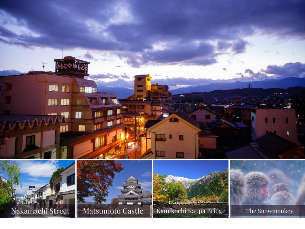 Evening townscape near Yumotoya Nagano Rooftops and illuminated streets with Yumotoya building and distant mountains under a twilight sky in Nagano