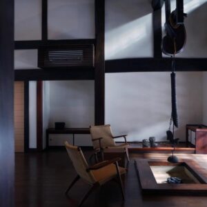 Low wooden irori hearth and chairs inside kutokuan, Gifu, Chūbu, Japan