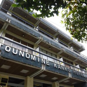 Multi-story building facade with balconies at Hôtel touristique Tōnomine in Nara